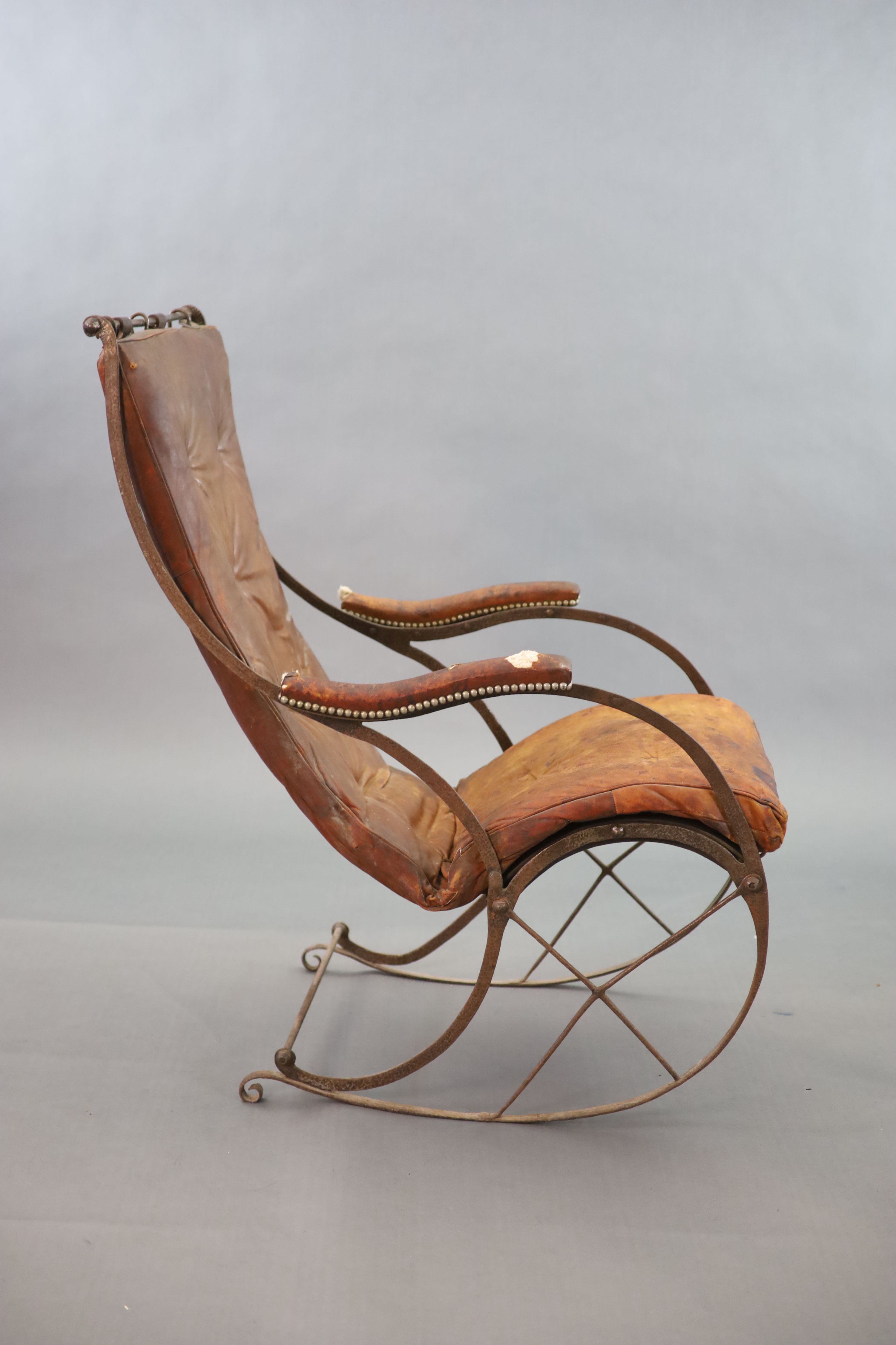 After R.W Winfield & Co, Birmingham, a mid 19th century rocking chair, 59cm wide, 83cm deep, 105cm high.